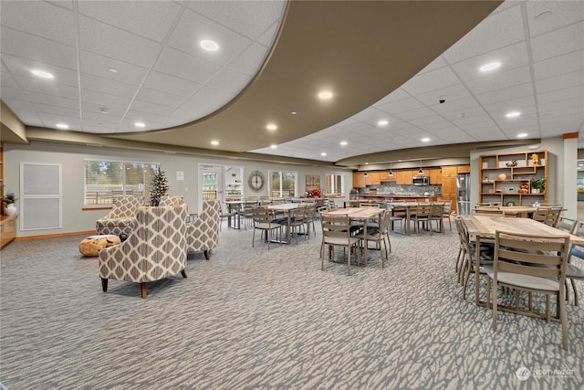 view of carpeted dining area