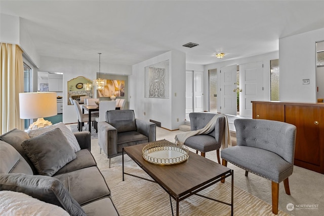 4144 94th Ave SE, Mercer Island, WA 98040 - carpeted living room with a chandelier