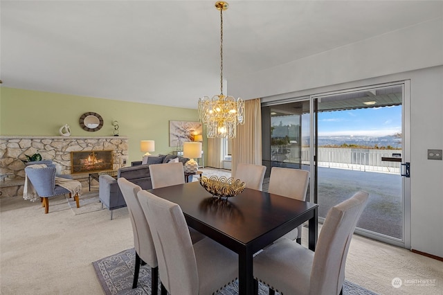 4144 94th Ave SE, Mercer Island, WA 98040 - carpeted dining room featuring a stone fireplace and a notable chandelier