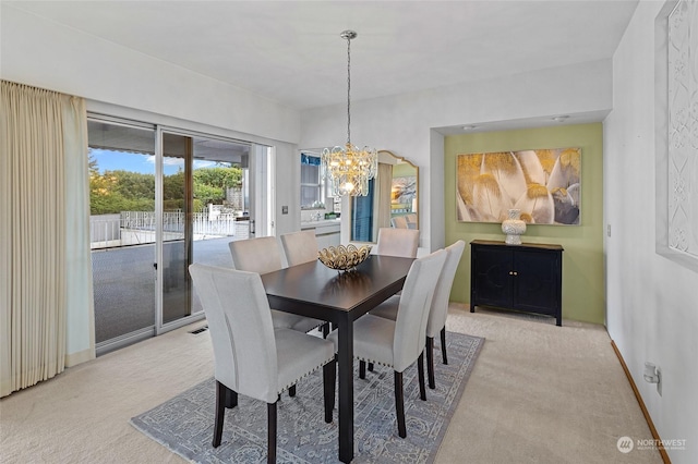4144 94th Ave SE, Mercer Island, WA 98040 - carpeted dining area with an inviting chandelier