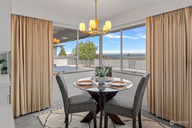 4144 94th Ave SE, Mercer Island, WA 98040 - carpeted dining room with a notable chandelier