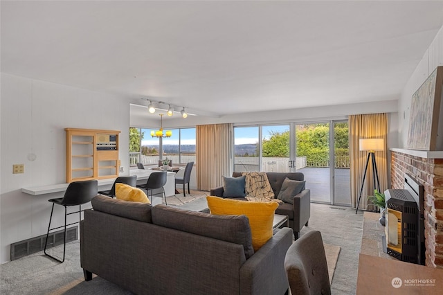 4144 94th Ave SE, Mercer Island, WA 98040 - living room with plenty of natural light, heating unit, light carpet, and rail lighting