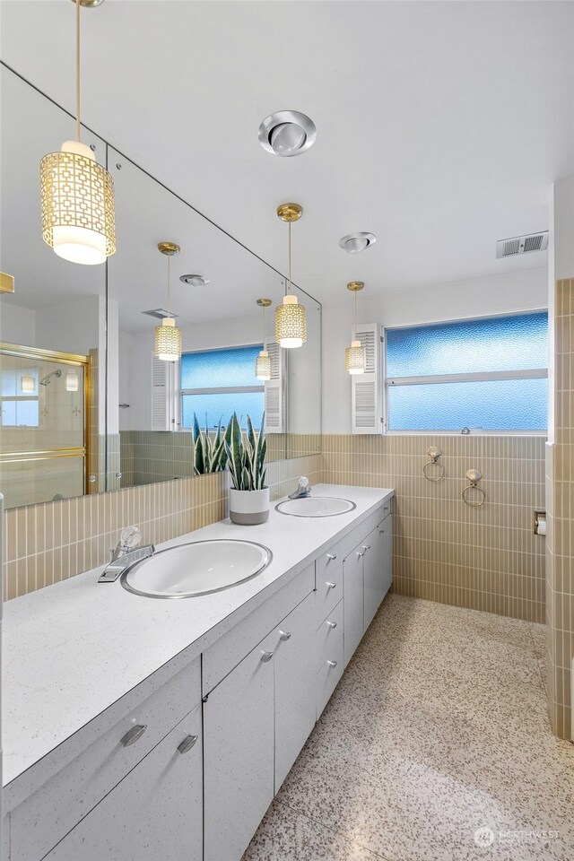 4144 94th Ave SE, Mercer Island, WA 98040 - bathroom with tile walls, an enclosed shower, and vanity
