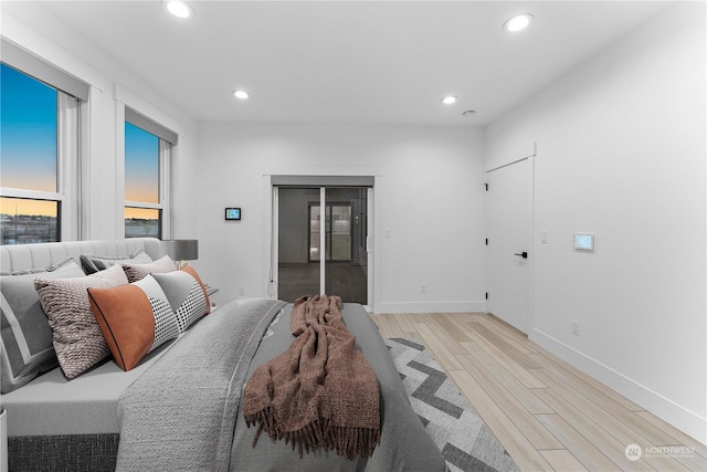 bedroom featuring light wood-type flooring