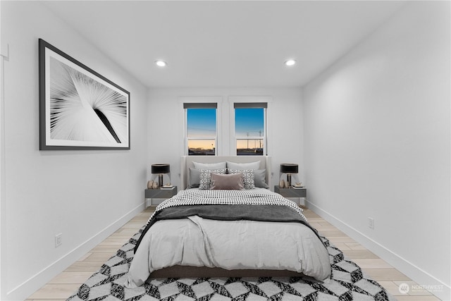 bedroom with light wood-type flooring