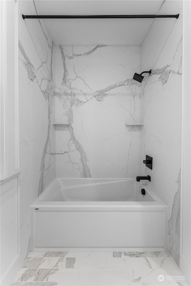 bathroom featuring washtub / shower combination