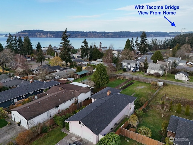 aerial view featuring a water view