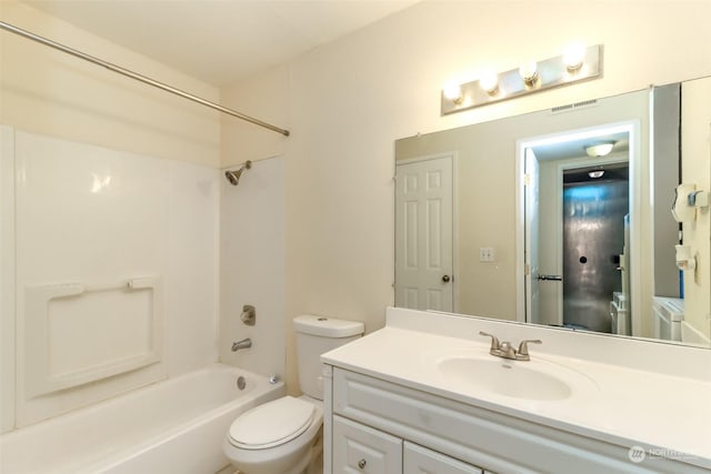 full bathroom with vanity, washer / clothes dryer, toilet, and shower / bathtub combination