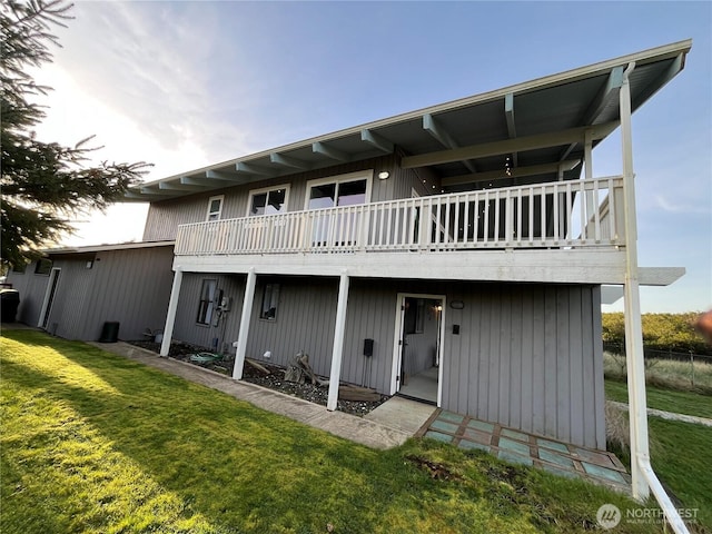 373 Sand Dune Ave NW, Ocean Shores, WA 98569 - rear view of property with a lawn