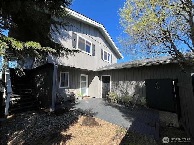 373 Sand Dune Ave NW, Ocean Shores, WA 98569 - rear view of property featuring stairs and a patio