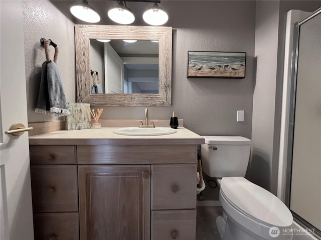 373 Sand Dune Ave NW, Ocean Shores, WA 98569 - bathroom featuring vanity and toilet