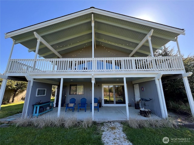 373 Sand Dune Ave NW, Ocean Shores, WA 98569 - back of house with a balcony and a patio area