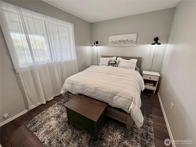 373 Sand Dune Ave NW, Ocean Shores, WA 98569 - bedroom featuring dark wood finished floors and baseboards