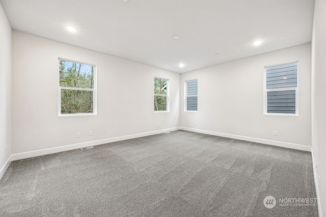 view of carpeted spare room