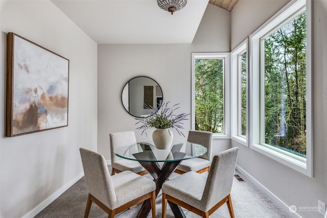 dining area with carpet flooring