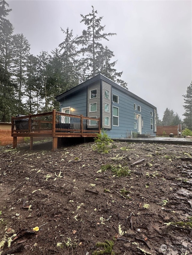 exterior space featuring a wooden deck