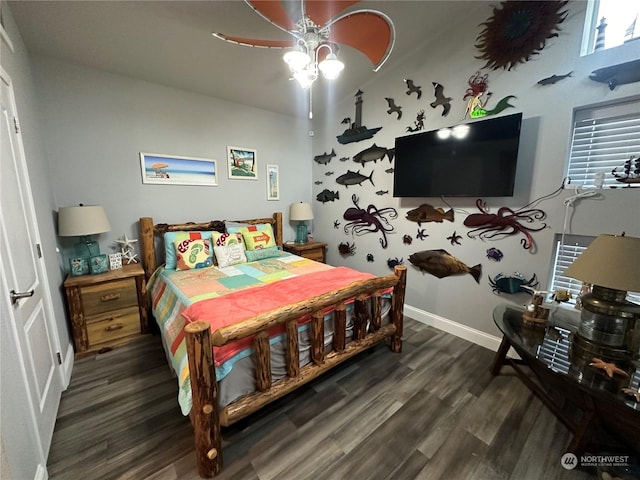 bedroom featuring ceiling fan and dark hardwood / wood-style floors