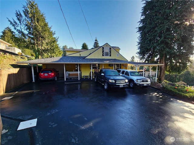 view of front of house featuring a carport