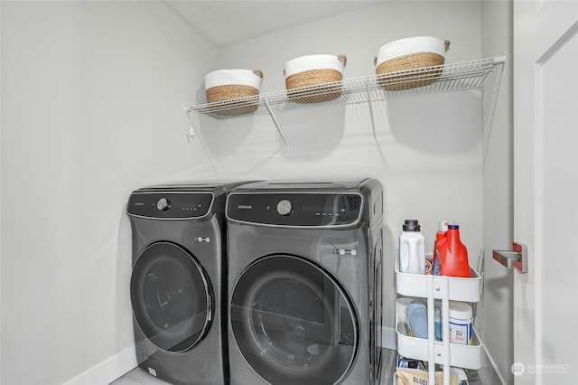 laundry room with separate washer and dryer