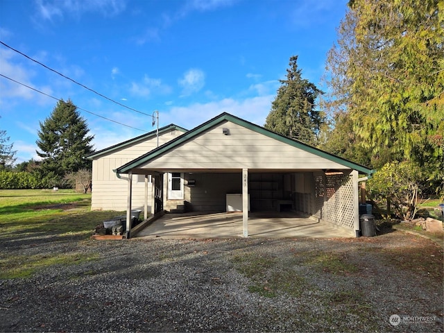 view of front of property with a carport