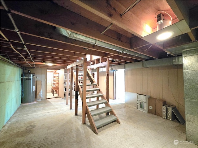 basement featuring strapped water heater