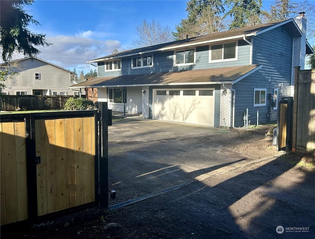 view of front of property with a garage