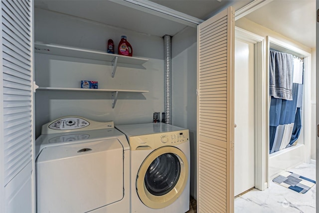 washroom featuring separate washer and dryer