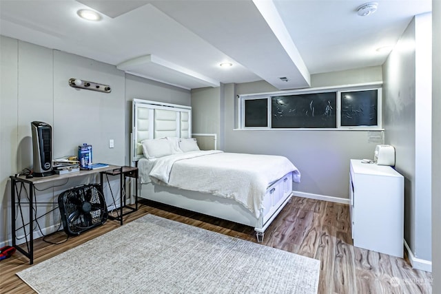 bedroom featuring hardwood / wood-style floors