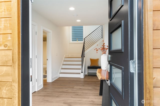 foyer entrance featuring hardwood / wood-style floors