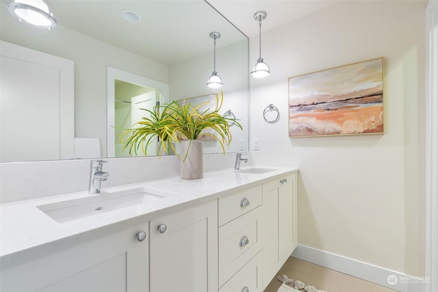 bathroom with vanity and tile patterned floors