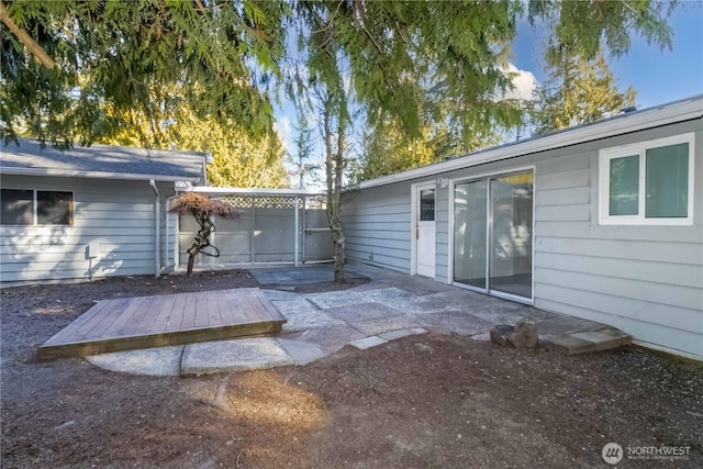 exterior space with a patio area and fence