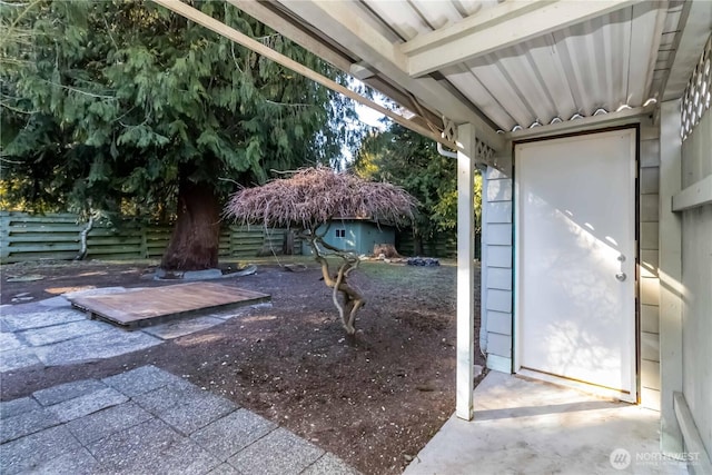 view of yard featuring a patio area and fence