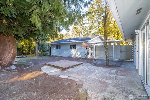 garage featuring fence