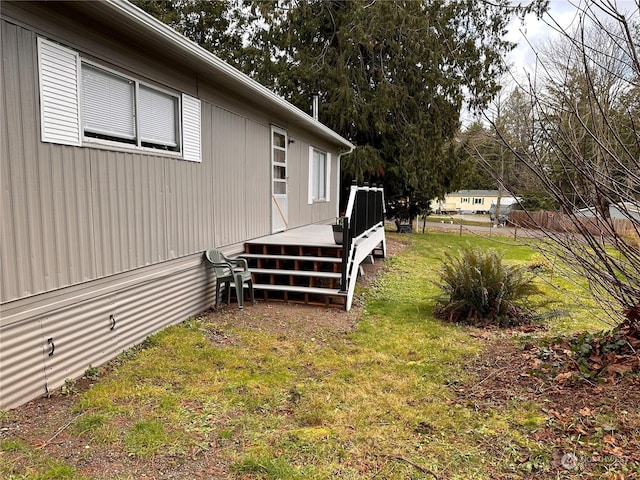 view of yard featuring a wooden deck