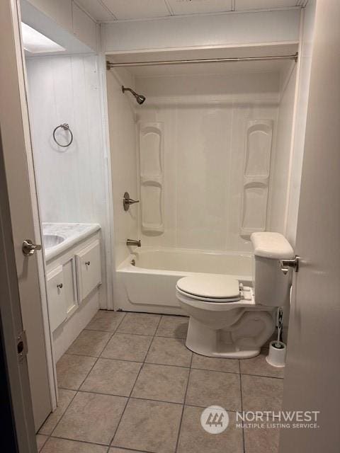 full bathroom featuring tile patterned flooring, vanity, tub / shower combination, and toilet