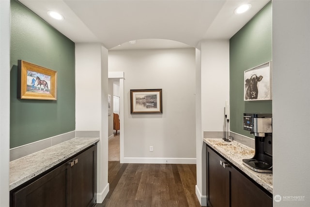 bathroom with hardwood / wood-style floors and vanity