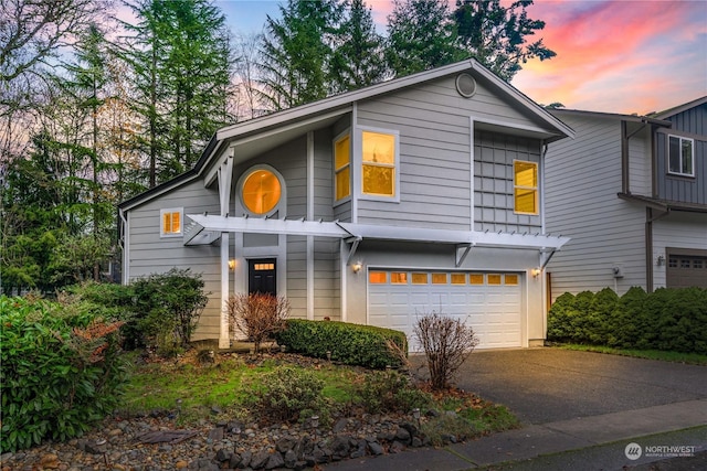 view of front of house with a garage