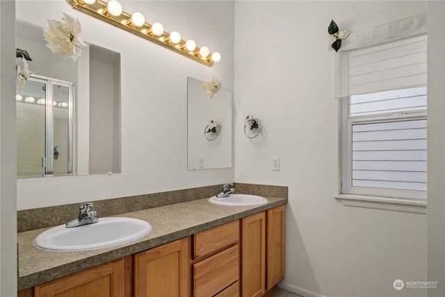 bathroom featuring vanity and walk in shower