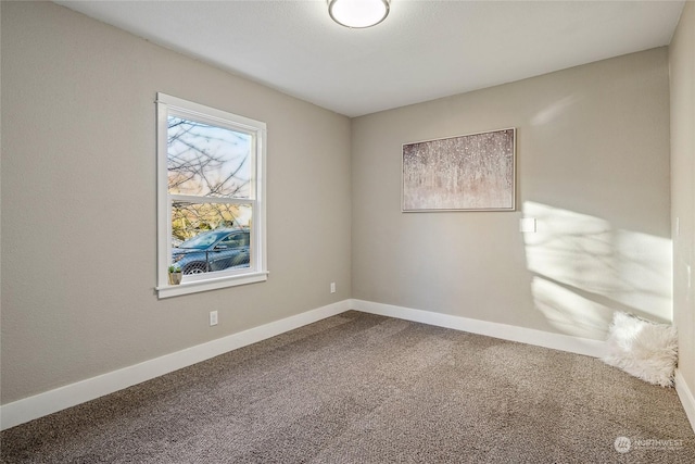 view of carpeted spare room