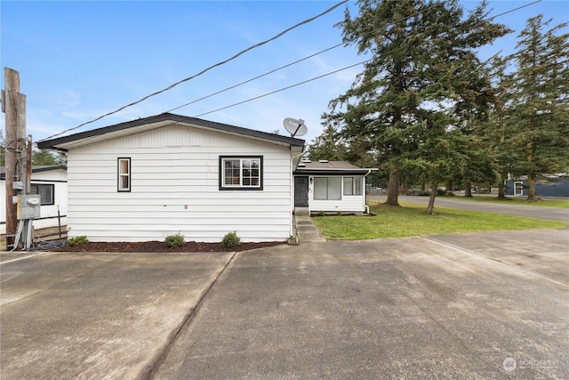 exterior space featuring a yard