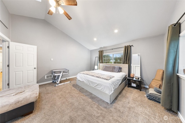 bedroom with light colored carpet, ceiling fan, and lofted ceiling