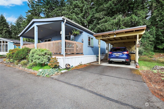 view of front of house with a carport