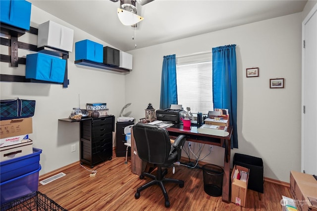 office area with wood-type flooring