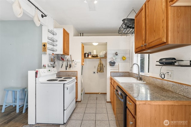 kitchen with black dishwasher, sink, white electric range oven, and light tile patterned floors