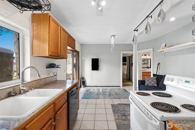 kitchen with electric stove, light tile patterned flooring, dishwasher, and sink