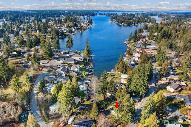 drone / aerial view with a water view