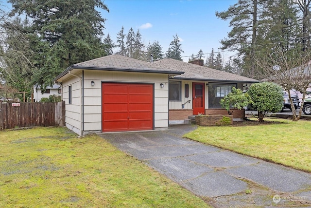 ranch-style house with a garage and a front lawn