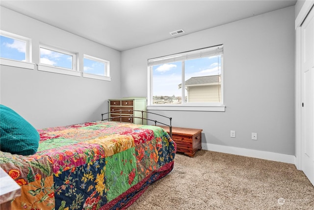 bedroom featuring carpet flooring