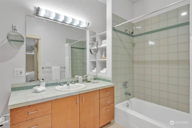 bathroom featuring vanity and shower / bath combo