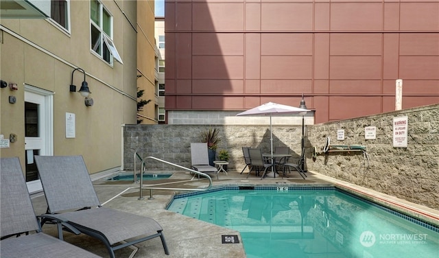 view of pool with a patio